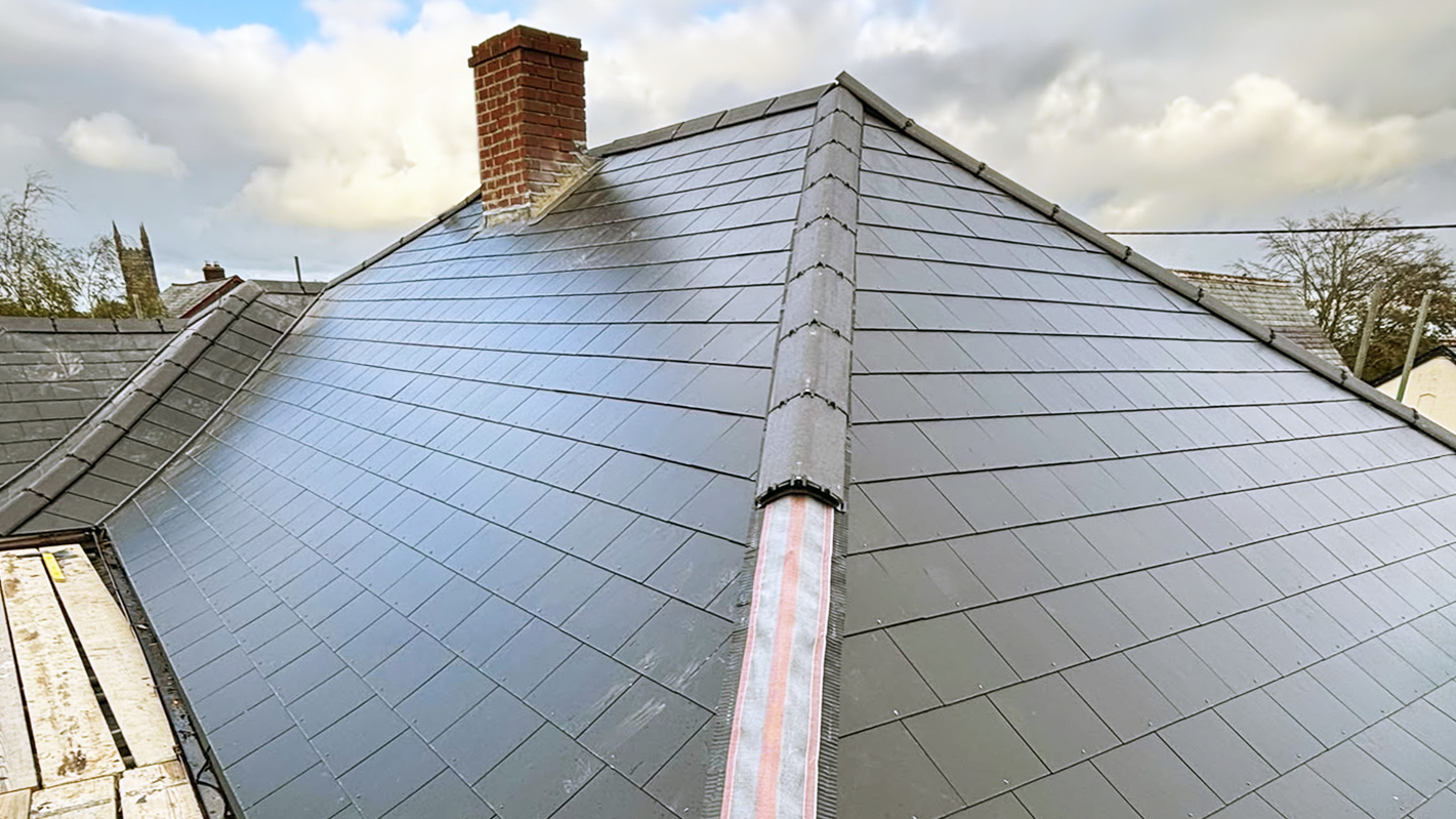 New dry ridge system fitted to secure roof covering by a proven Roofer