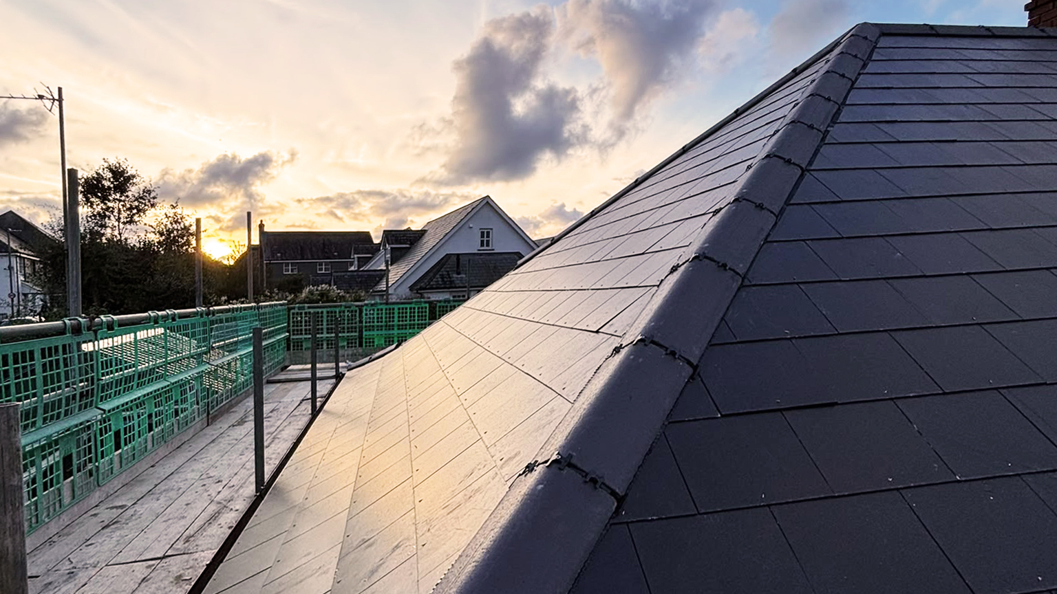 After: complete roof replacement with Jutland Slates in Week St Mary by a proven Roofer