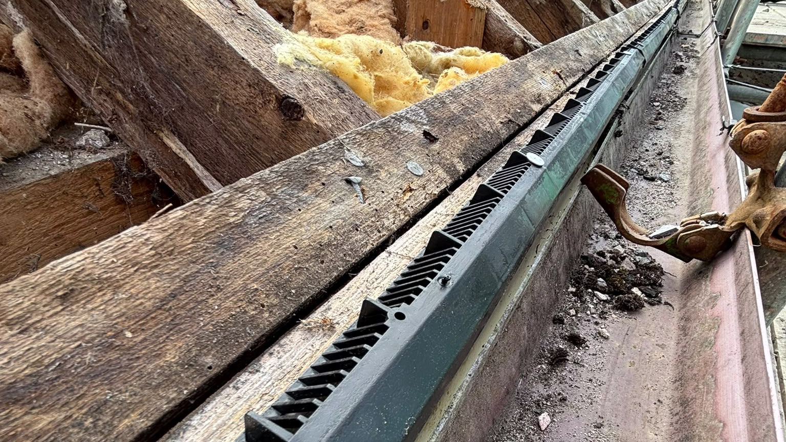 New over-fascia vents being fitted to improve ventilation by a trusted Roofer